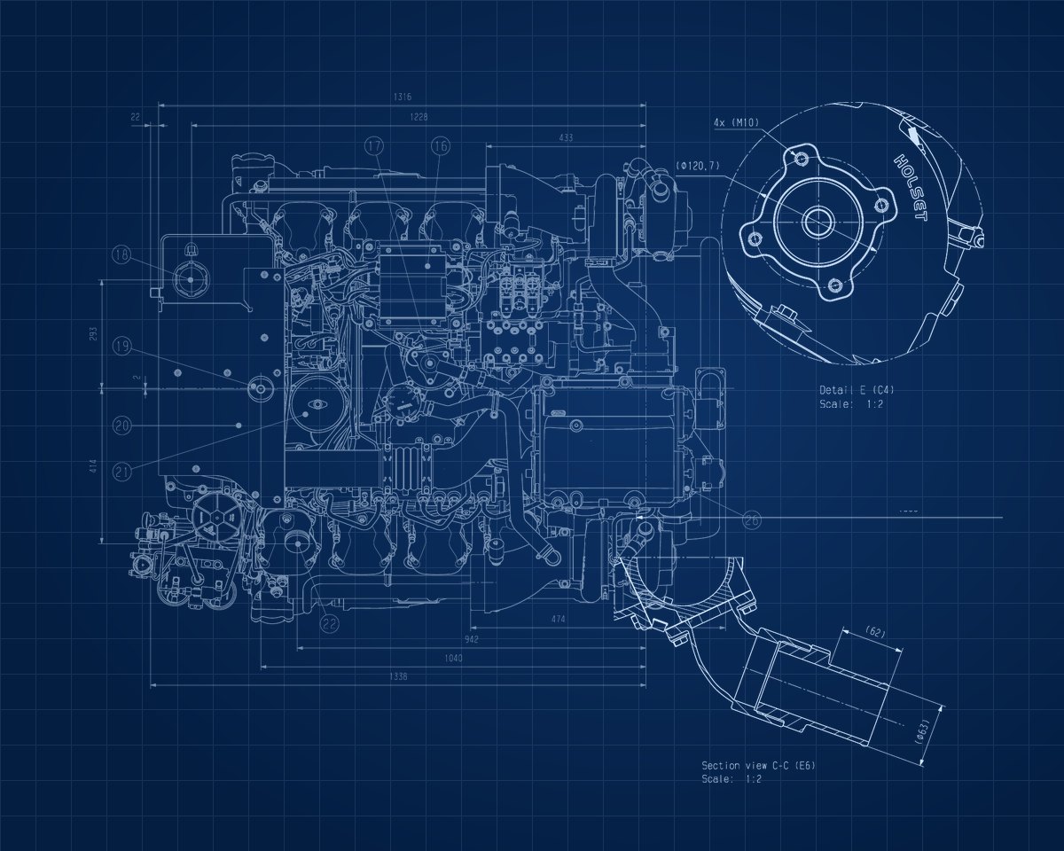 Technician using diagnostic software on an engine